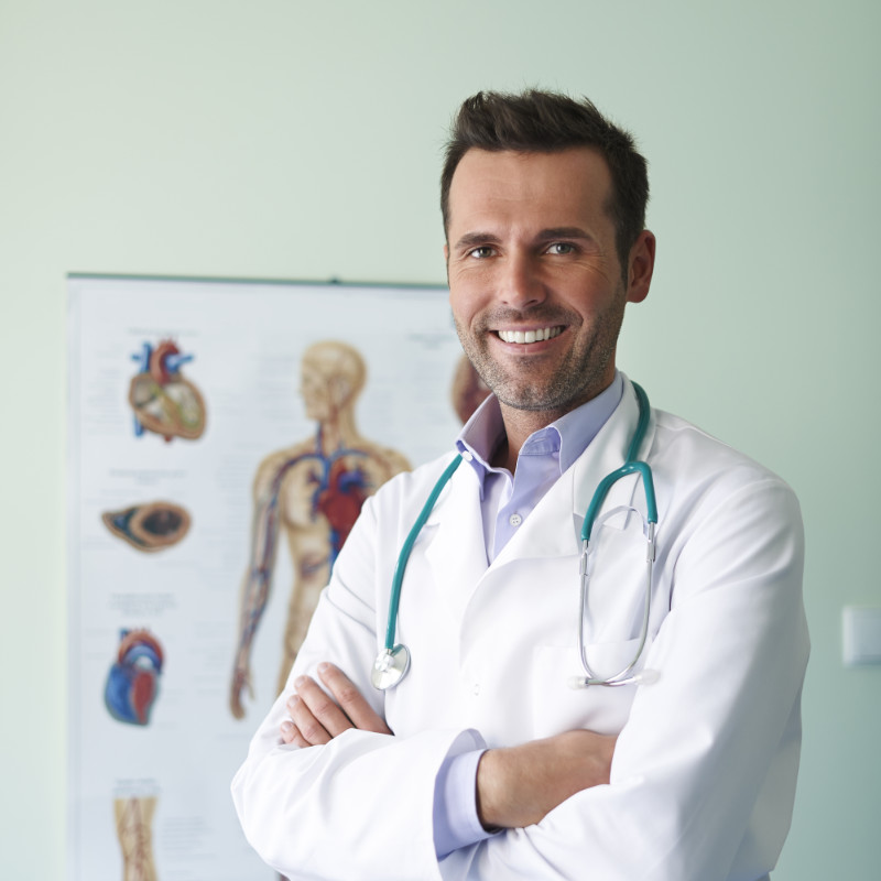 Doctor with anatomy chart